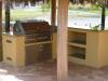 Lynx built in bbq grill in custom grill island and outdoor bar with granite
