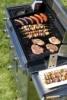 The grill w the meat, spits and sausages stock photography