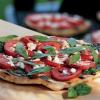 Grilled pizza with pesto tomatoes and feta
