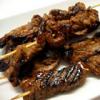 Asian Beef Skewers - Strips of flank steak are marinated overnight in a very flavorful mixture of hoisin sauce, soy sauce, ginger, sherry, barbeque sauce, green onions and garlic. Skewer, grill and serve as an entree or appetizer.