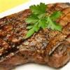 Sirloin Steak with Garlic Butter - What's better than a sirloin steak cooked to perfection on the grill? A sirloin steak cooked to perfection on the grill and then brushed with this yummy butter sauce laced with lots of garlic!