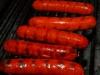Bbq_vlees : Een rij van vijf hotdogs op een bbq grill