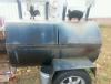 BBQ charcoal and gas grill on trailer with fryer area. Custom made